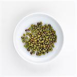 A plate of green mungo beans, seen from above