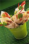 Chicken wraps with pepper strips and coriander