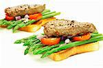 Toast with asparagus and beef steak