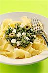 Tagliatelle with spinach, sheep's cheese and olives