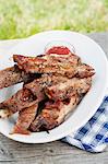 Grilled spare ribs and barbecue sauce