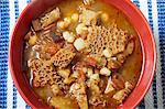 Bowl of Menudo Colorado or "Red Menud"; A Classic Mexican Tripe Stew