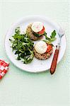 Spinach cakes with tomato, mozzarella and rocket