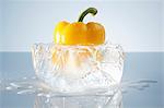 Yellow pepper in a block of ice