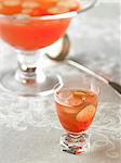 Glass of Venetian Punch Royale with Cucumber Slices; Punch Bowl