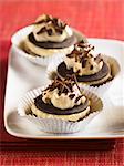 Three Cream Filled Chocolate Cookies with Chocolate Shavings; In Muffin Cups