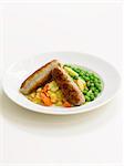 Sausages with potatoes and peas