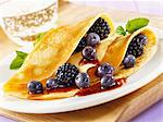 Pancakes with blueberries and blackberries