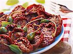 Dried tomatoes with capers and sage
