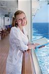 Teenage Girl Reading Book on Cruise Ship