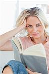 Blonde female with a book