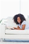 Portrait of a cute  woman reading a book