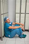 Surgeon sitting in a locker room