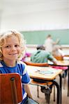 Elementary school student not paying attention to teacher