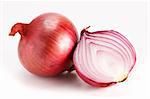 Close-up of vibrant delicious fresh red onions. Isolated on white.