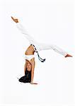 Girl performing Brazilian martial art dance - Capoeira