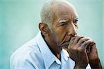 Seniors portrait of contemplative old african american man looking away. Copy space