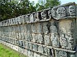 Chichen Itza - the main pyramid El Castillo also called The Temple of Kukulcan. This is one of the new 7 wonders of the world. Located in the Yucatan Peninsula of Mexico. The wall of skulls was the place to hang the heads of defeated or sacriificed warriors.