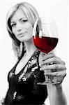 Attractive young woman with glass of red wine