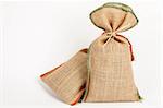 jute bags decorated with colored thread in them, for example, spices