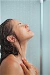 Portrait of woman bathing in shower