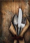 Vintage silverware on rustick wooden background