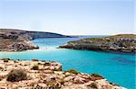 Pure crystalline water surface around an island (Lampedusa)