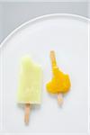 Partially Eaten Popsicles on Plate