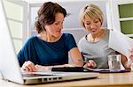 Women working together on laptop