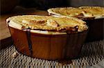 Close up of dishes of baked pie