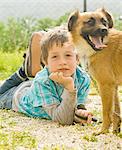 Boy with dog, portrait