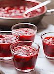 Homemade Strawberry Jam Cooling in Glass Cups