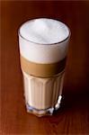 A glass of latte macchiato