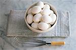 Bowl of White Eggs; Whisk; From Above