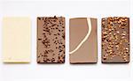 Four different bars of chocolate