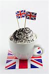 A cupcake with cream and Union Jacks