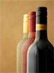 Three bottles of wine: red wine, rose wine and white wine
