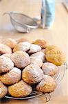 Home-made pumpkin biscuits on a wire rack