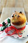 Mini panettone tied with ribbon on a plate