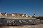 Statues and plaque at Overhanging Great Wall, Jiayuguan, Silkroad, china