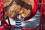 People beating drum for a wish during the Chinese New Year at Po Lin Monastery, Lantau Island, Hong Kong