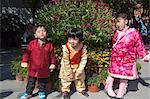 Children posing for photo at Po Lin Monastery, Lantau Island, Hong Kong