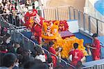 Lion dance celebrating the chinese new year at Ocean Theatre, Ocean Park, Hong Kong