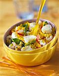 Yellow rice,cod,shrimp and vegetable salad