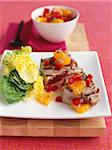 Tuna with orange and red peppers