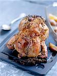 Roast guinea-fowl with bacon and herbs