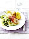 Rolled turkey fillet with prosciutto and parmesan,zucchinis and potatoes with rosemary