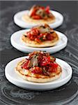 Blinis with ceps and tomatoes