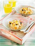 Porridge and amaranth gruel with hazelnuts,prunes and dried apricots