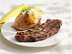 Grilled steak with baked potato